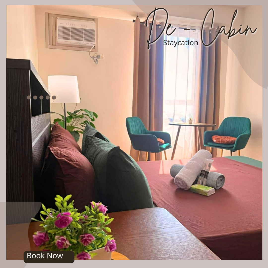 Urban Den — bed and teal chairs